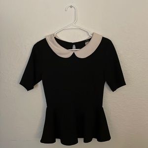 Black top, white collar